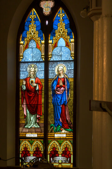 Stained glass window detail at Holy Trinity Catholic Church in Okarche Oklahoma.