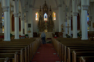 Religious statues and interior decor at Holy Trinity Catholic Church in Okarche Oklahoma.