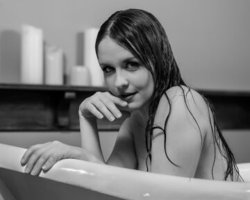 Artistic portrait of Kate in a vintage bathtub setting photography
