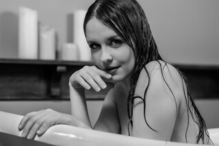 Artistic portrait of Kate in a vintage bathtub setting photography