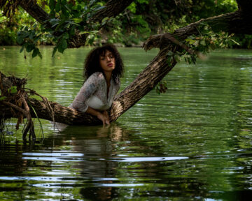 Artistic portrait of Lina at Pillsbury Crossing with natural waterfall background and scenic river views